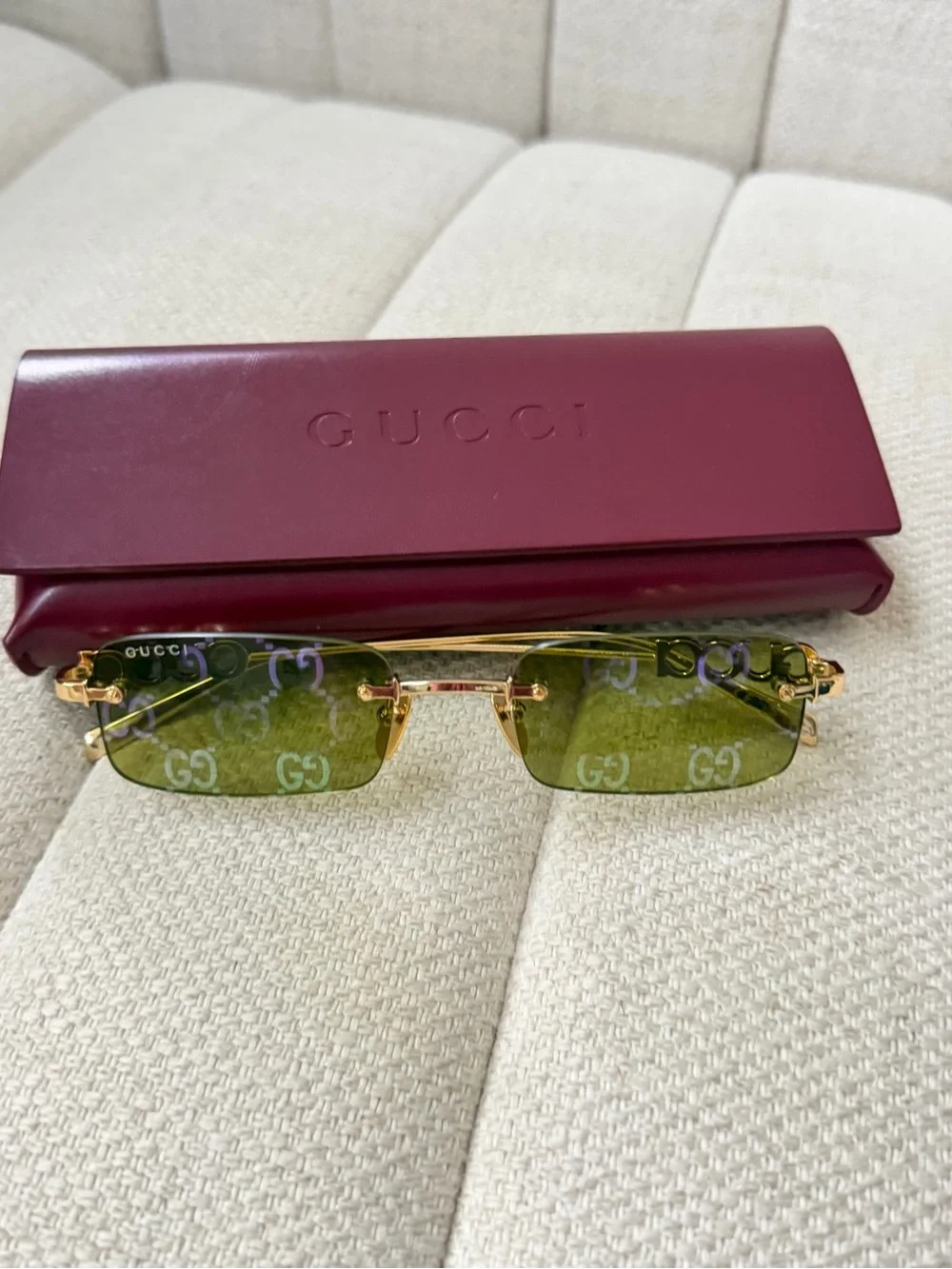 Gucci women’s Rimless Logo Sunglasses in Green